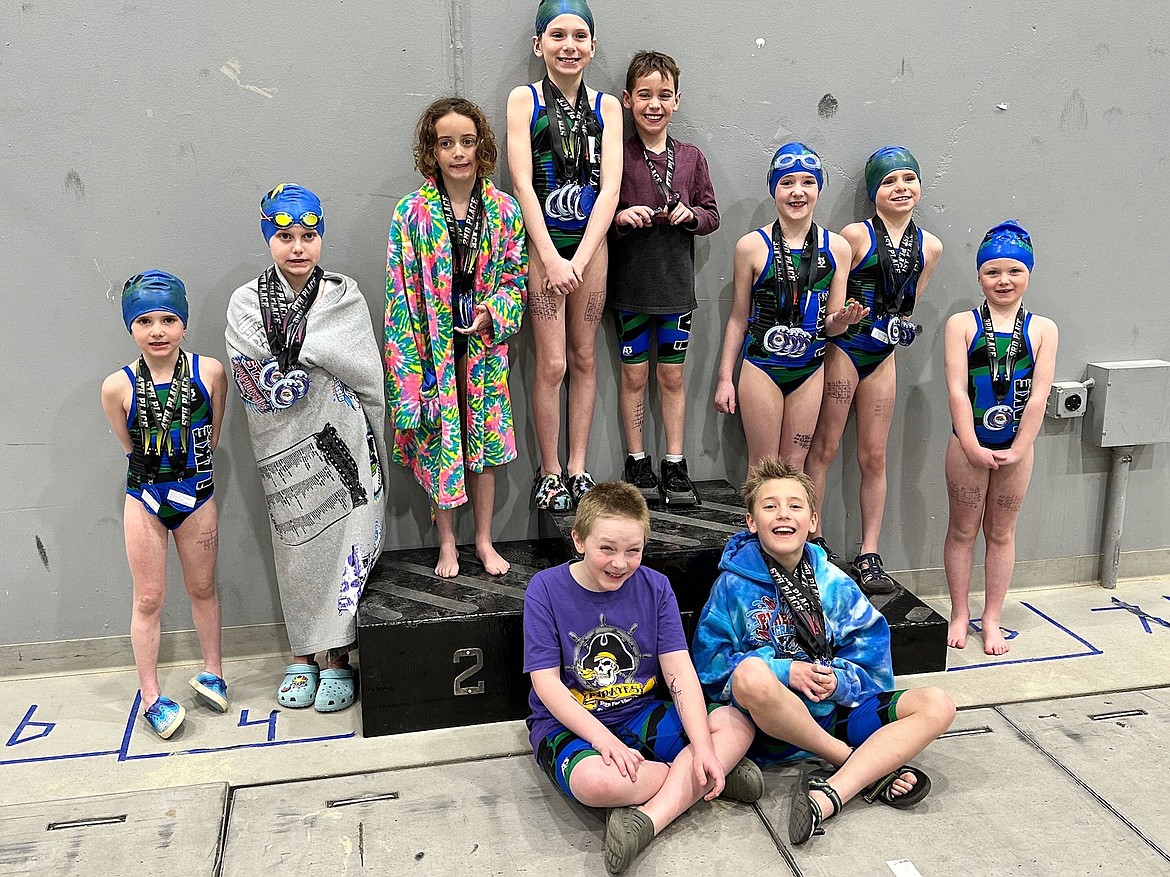 An excited gang of Lake Monsters, who placed third out of 11 teams at the Montana Short Course Junior B-C Championship Meet held March 3-4 in Missoula.