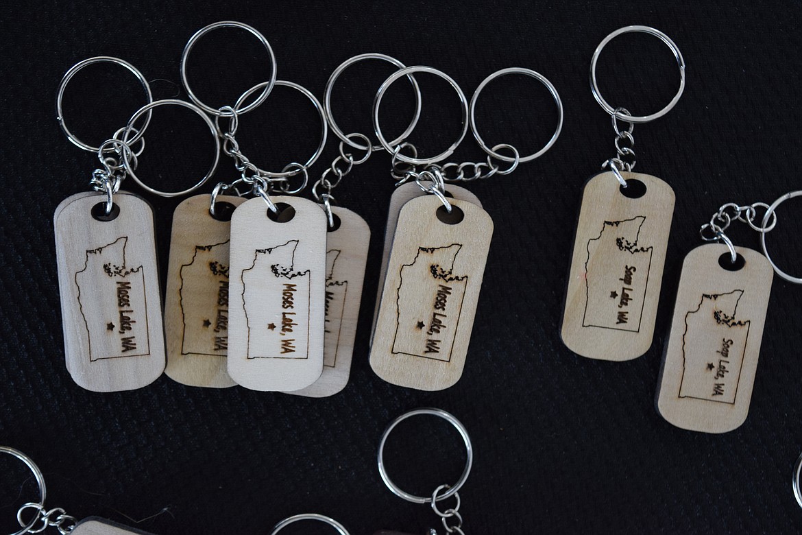 A collection of wooden Moses Lake keychains made and sold by A Plus Woodshop in their new storefront at 205 S. Division St. in the Downtown Moses Lake Association’s Obra Project business incubator.