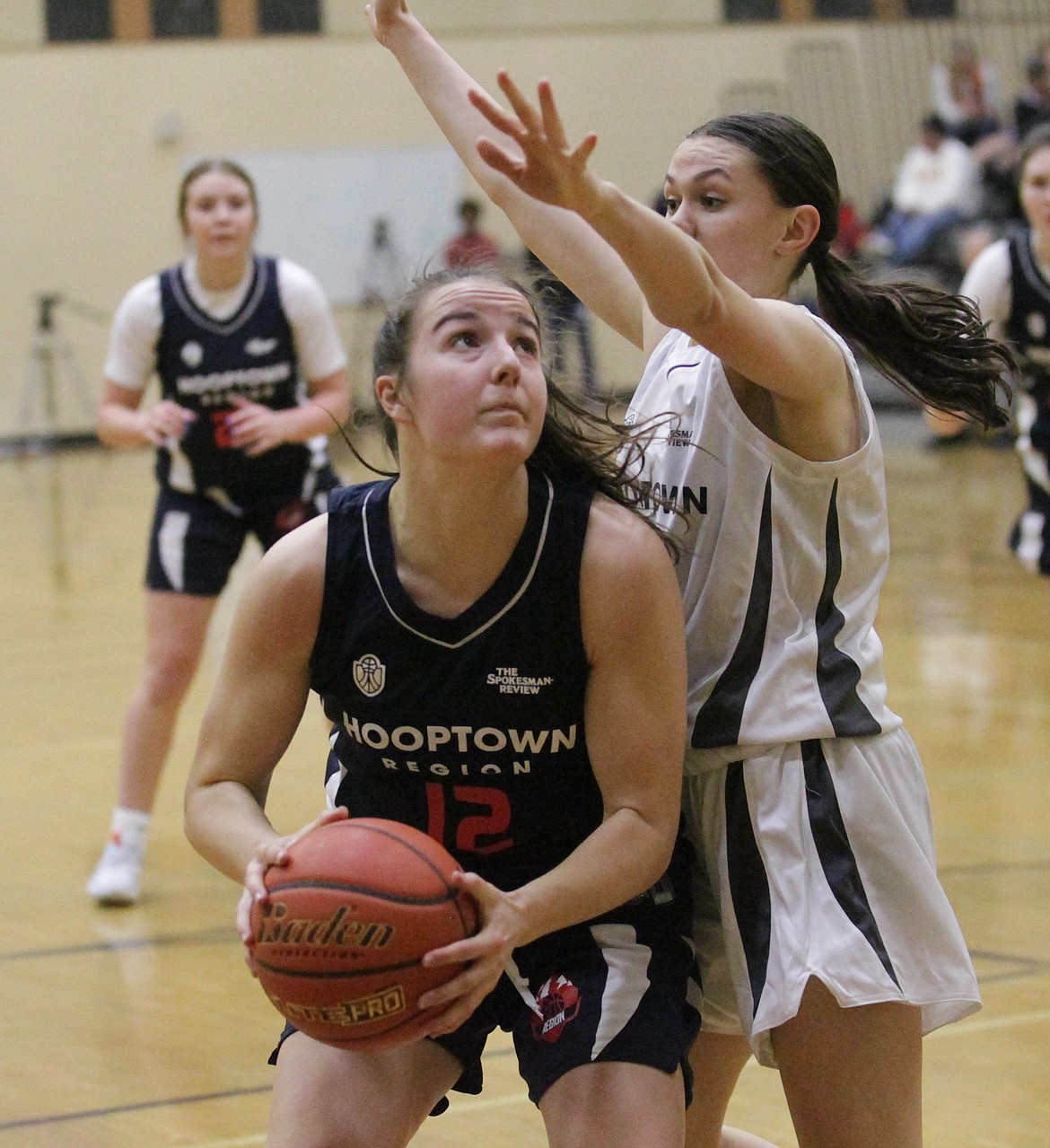 MARK NELKE/Press
Capri Sims (Post Falls High) of the Region team looks to put up a shot in the Jack Blair Memorial high school all-star girls basketball game Tuesday night at Lewis and Clark High in Spokane.