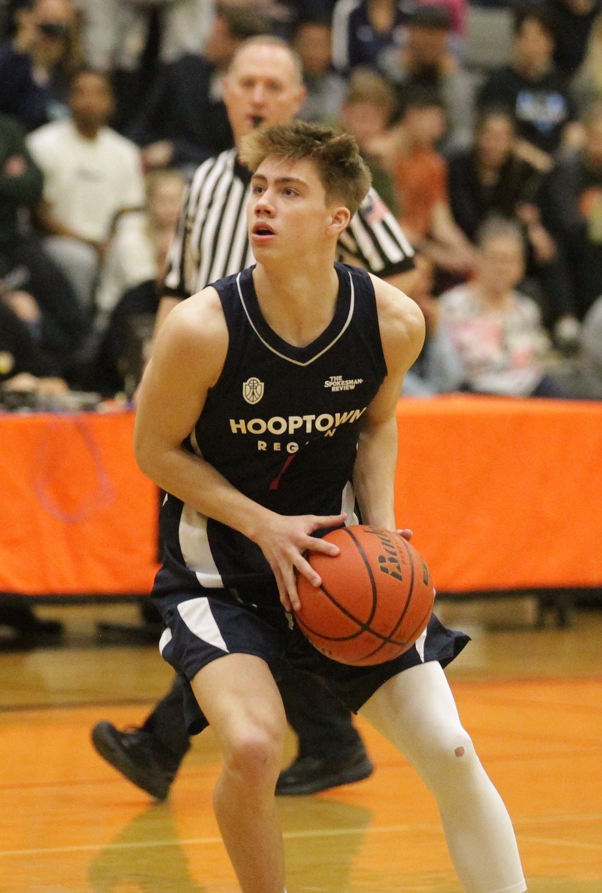 MARK NELKE/Press
Kolton Mitchell of Lake City looks to put up a shot for the Region team in the Denny Humphrey Memorial all-star high school boys basketball game Tuesday night at Lewis and Clark High in Spokane.