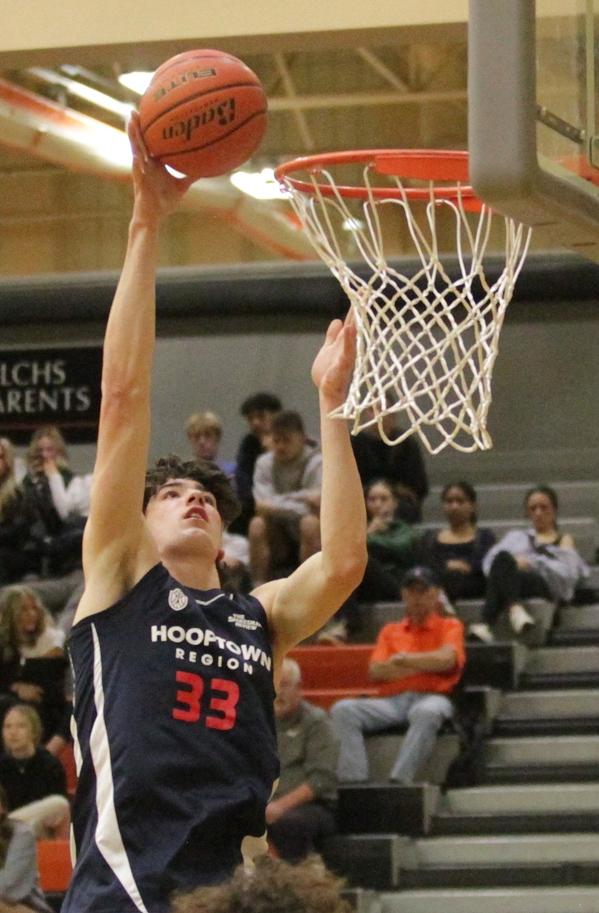 MARK NELKE/Press
Blake Buchanan (Lake City) of the Region puts up a hook shot during the Denny Humphrey Memorial all-star high school boys basketball game Tuesday night at Lewis and Clark High in Spokane.