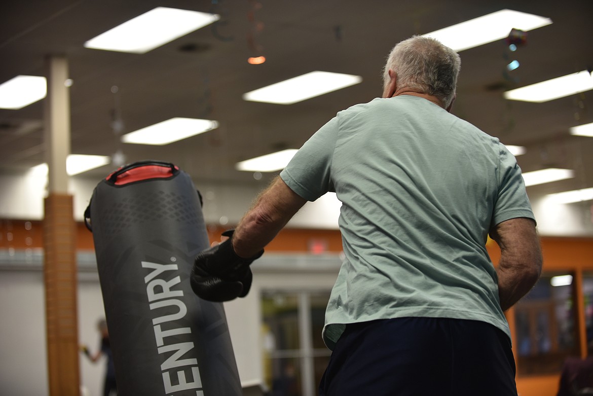 A participant goes through fitness drills at the Rock Steady Boxing — Glacier class on Monday, March 13, 2023, at Gateway Community Center in Kalispell. The no-contact boxing-based fitness program helps people with Parkinson's disease work on eye-hand coordination and movement.(Hilary Matheson/Daily Inter Lake)