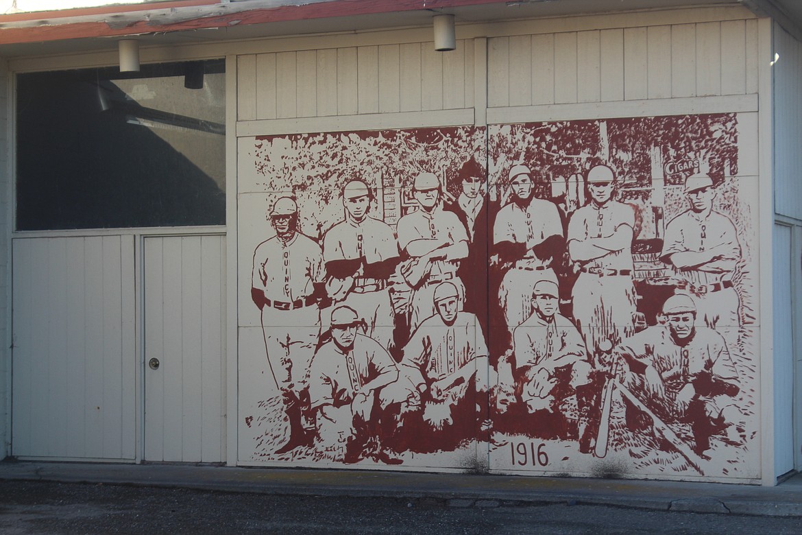 The town baseball team poses for a picture in pre-World War I Quincy in a mural at the intersection of Central Avenue South and F Street Southeast. Back in the day, every town had a baseball team.