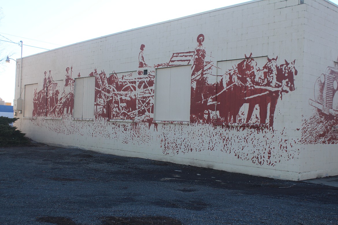 Wheat harvest in the early years of the 20th century required a lot of horses and a lot of hands. The harvest near Quincy is depicted in a downtown mural.
