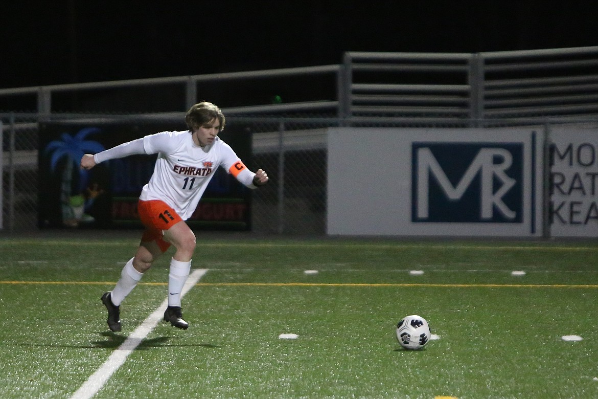 Ephrata junior Jaedon Truscott attempts a goal kick in the second half against Moses Lake.