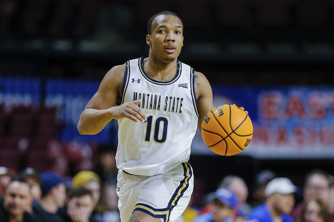 Montana State guard Darius Brown II (10) brings the ball up court against Northern Arizona in the first half of an NCAA college basketball game for the championship of the Big Sky men's tournament in Boise, Idaho, Wednesday, March 8, 2023, in Boise, Idaho. Montana State won 85-78. (AP Photo/Steve Conner)