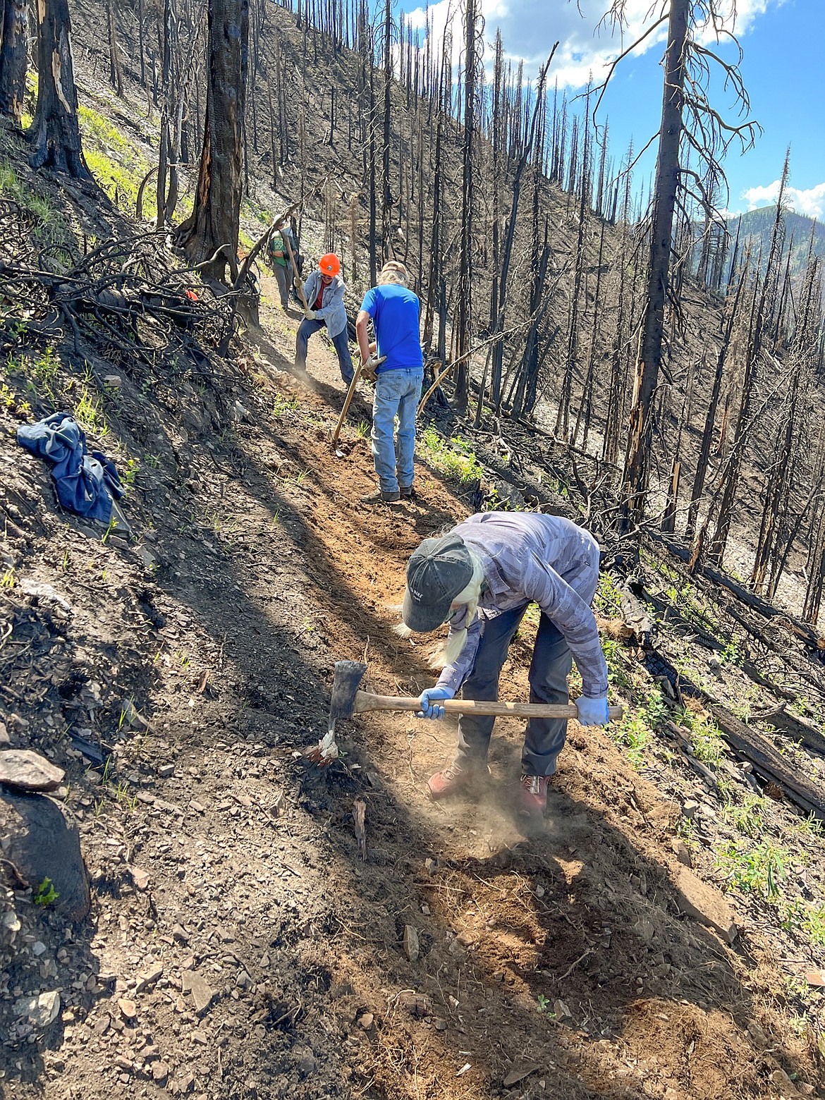 Idaho Trails Association volunteers clean up local trails during a past project.