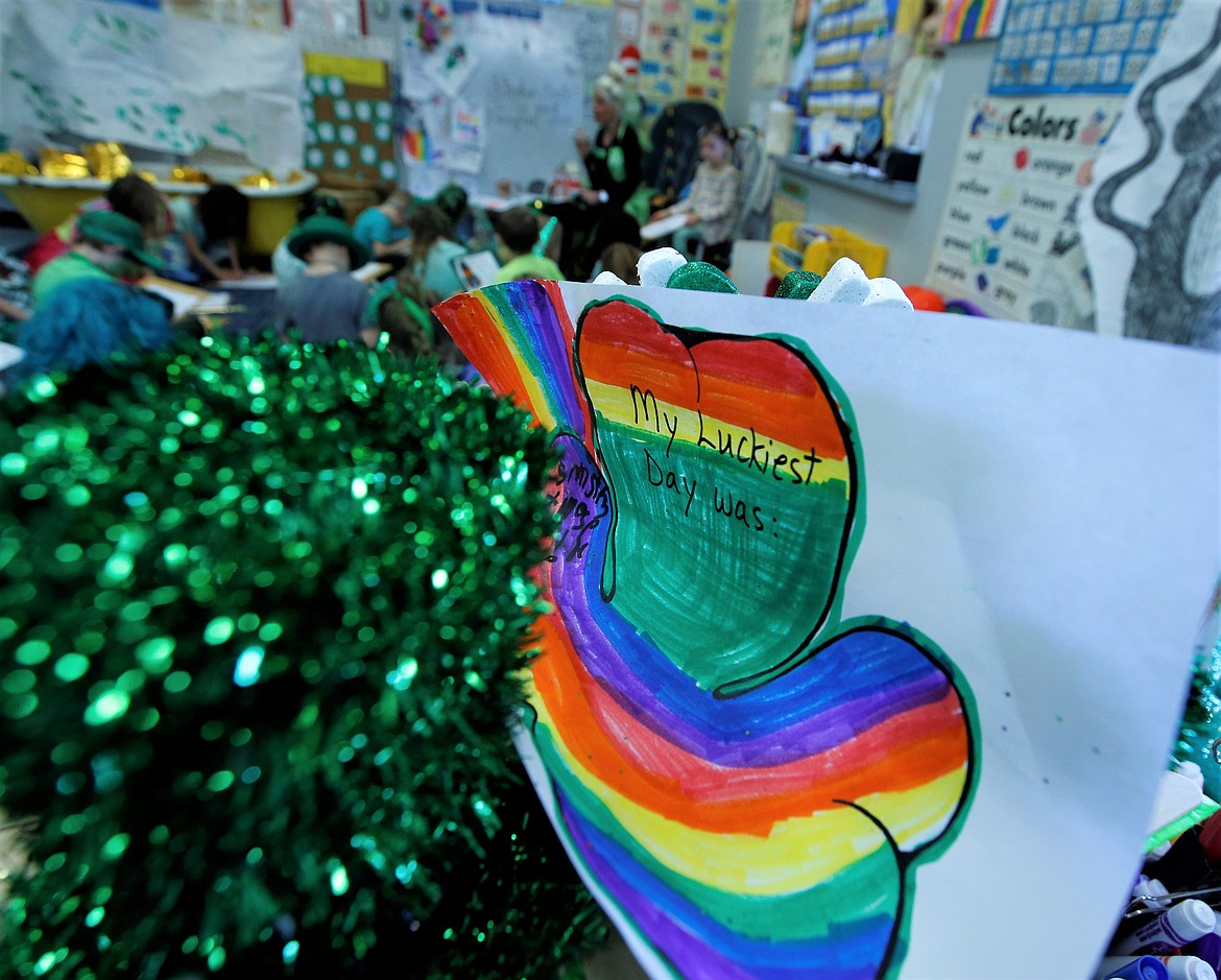 St. Patrick's Day artwork decorates a classroom at Kinder Magic on Thursday.