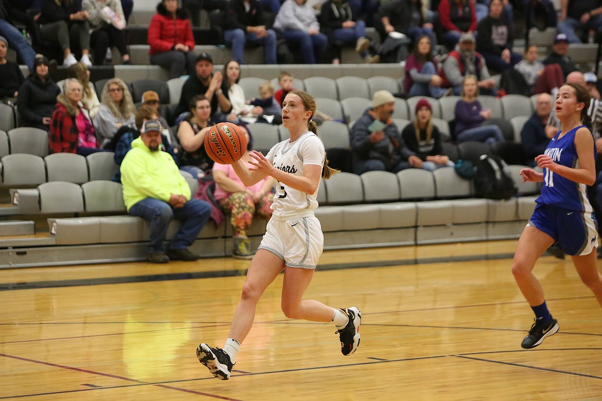 ACH senior Prairie Parrish, in white, was named to the Northeast 1B all-league’s first-team for girls basketball.