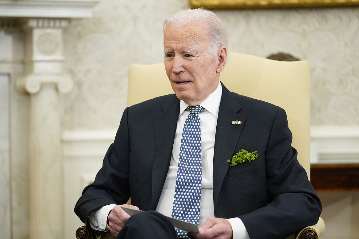 President Joe Biden speaks as he meets with Ireland's Taoiseach Leo Varadkar in the Oval Office of the White House, Friday, March 17, 2023, in Washington. Biden on Friday called on Congress to allow regulators to impose tougher penalties on the executives of failed banks, including clawing back compensation and making it easier to bar them from working in the industry. (AP Photo/Evan Vucci)