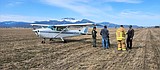 Plane lands in field
