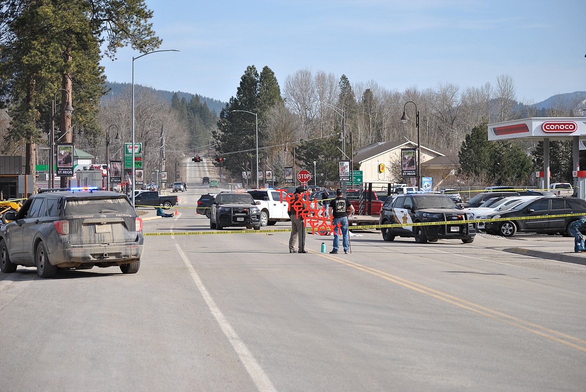 Law enforcement respond to the scene of a shooting in St. Regis on Saturday, March 18, 2023. (Amy L. Quinlivan/Mineral Independent)