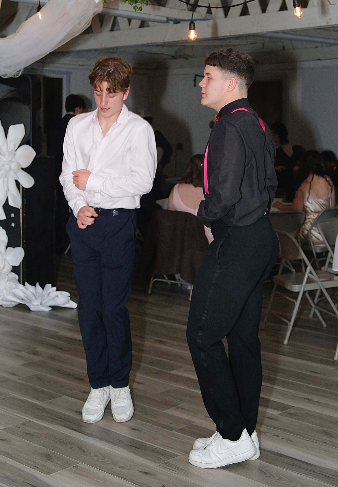 Foreign exchange students, (left) Flip Hoes from Rotterdam, Netherlands and (right) Eduardo (Eddy) Perianez from Seville, Spain on the dance floor enjoying the Plains High School prom. (Jessica Peterson photo)