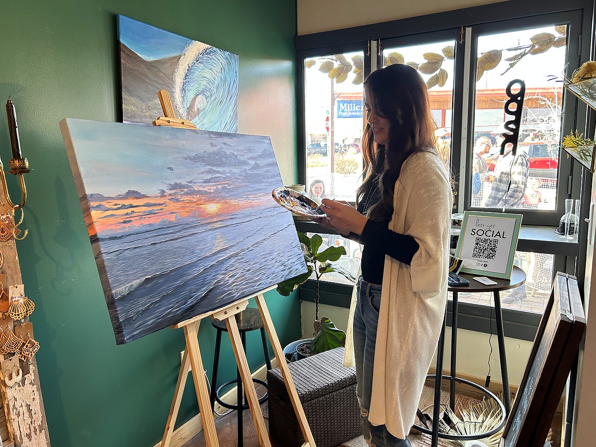 Love and Lumber also had an artist painting an ocean sunset for attendees to enjoy.