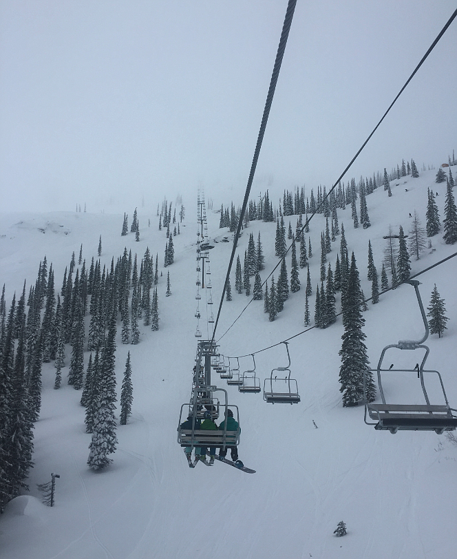 Skiers ride the Colburn Triple at Schweitzer Mountain Resort in 2021. Lift tickets will be just $20 Friday during Schweitzer's annual Community Day, which this year will support Community Cancer Services.