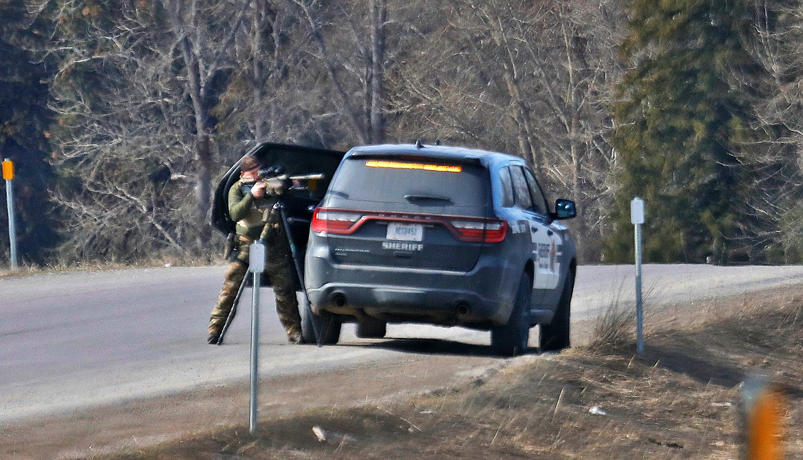 Law enforcement at the scene of a shooting in St. Regis on Saturday. (Jessica Peterson photo)