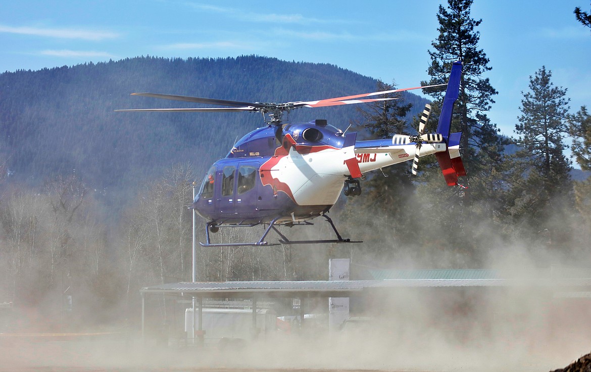 The Two Bear Air helicopter was called in to assist during a shooting at the Travel Center in St. Regis on Saturday. (Jessica Peterson photo)