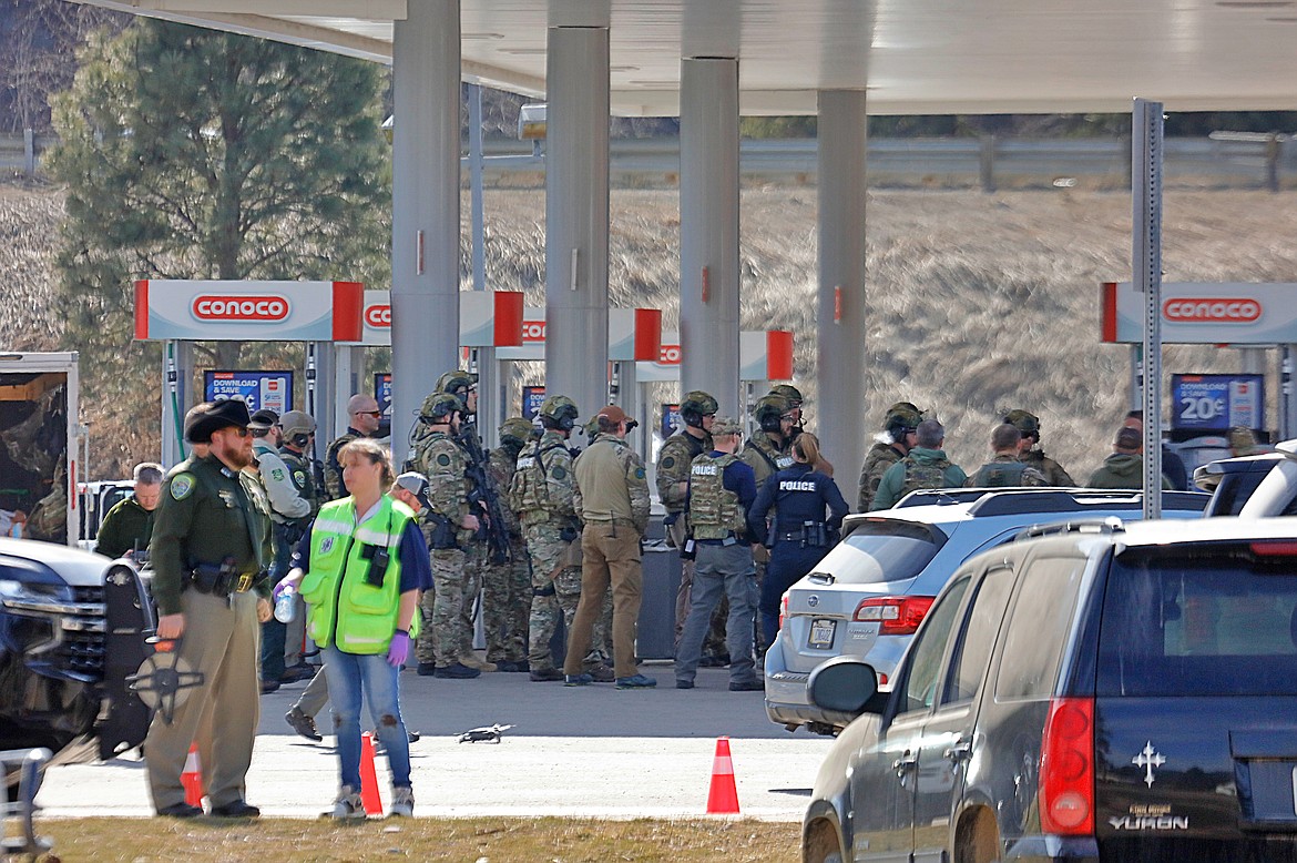 Law enforcement converge at the Travel Center in St. Regis on Saturday. (Jessica Peterson photo)