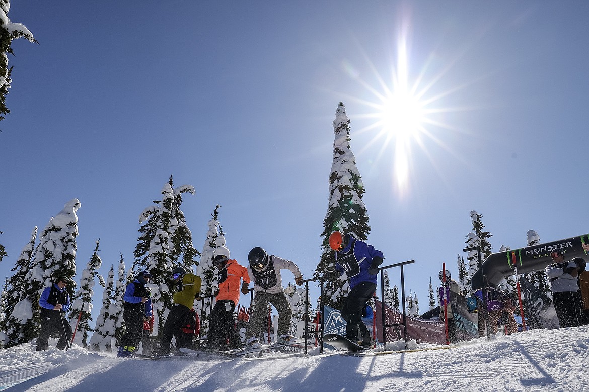 Competitors race in the 24th annual Nate Chute Banked Slalom and Boardercross event at Whitefish Mountain Resort on Sunday, March 19. (JP Edge photo)