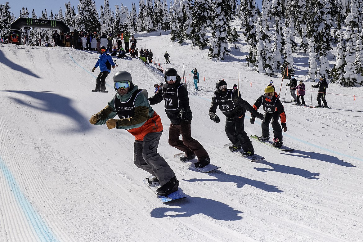 Competitors race in the 24th annual Nate Chute Banked Slalom and Boardercross event at Whitefish Mountain Resort on Sunday, March 19. (JP Edge photo)