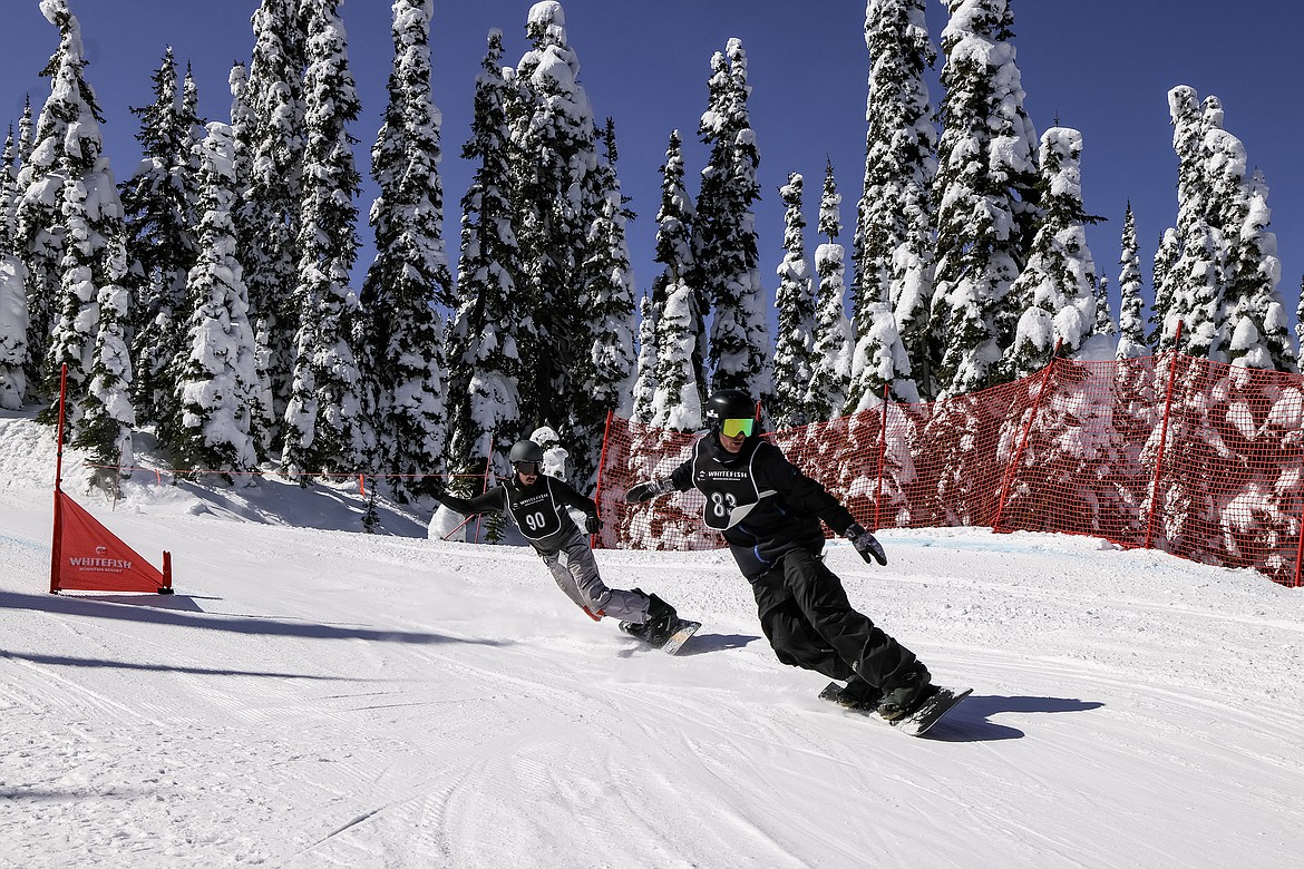 Competitors race in the 24th annual Nate Chute Banked Slalom and Boardercross event at Whitefish Mountain Resort on Sunday, March 19. (JP Edge photo)