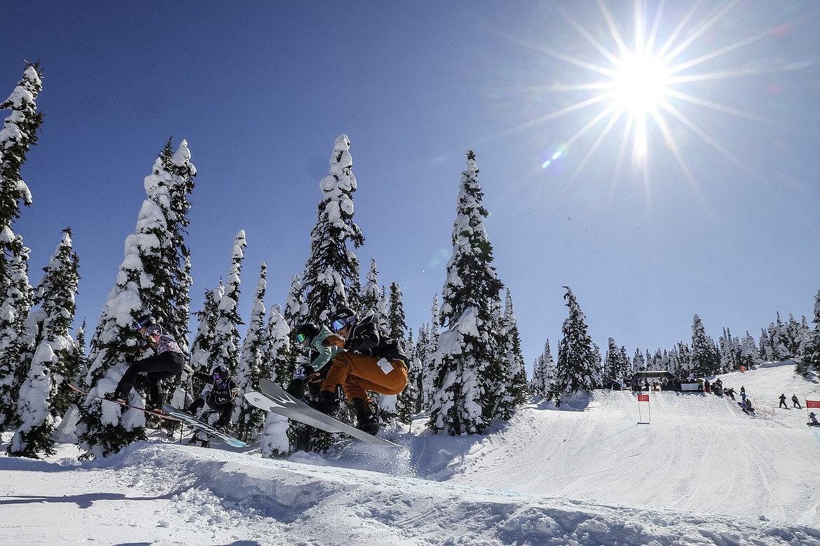 Competitors race in the 24th annual Nate Chute Banked Slalom and Boardercross event at Whitefish Mountain Resort on Sunday, March 19. (JP Edge photo)