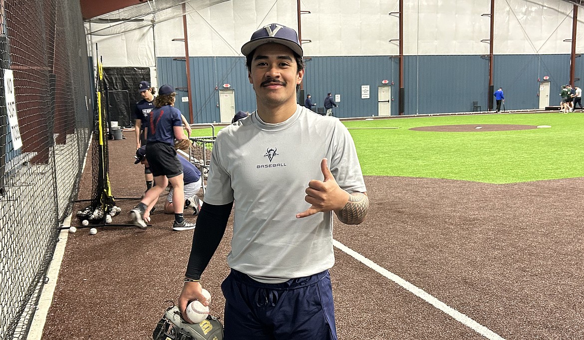 Big Bend's  Kalia Agustin just about to go off and join everyone in practice. He is an infielder on the team from Pa’auilo, Hawaii, who is looking to become a firefighter back in Hawaii once finished with school.