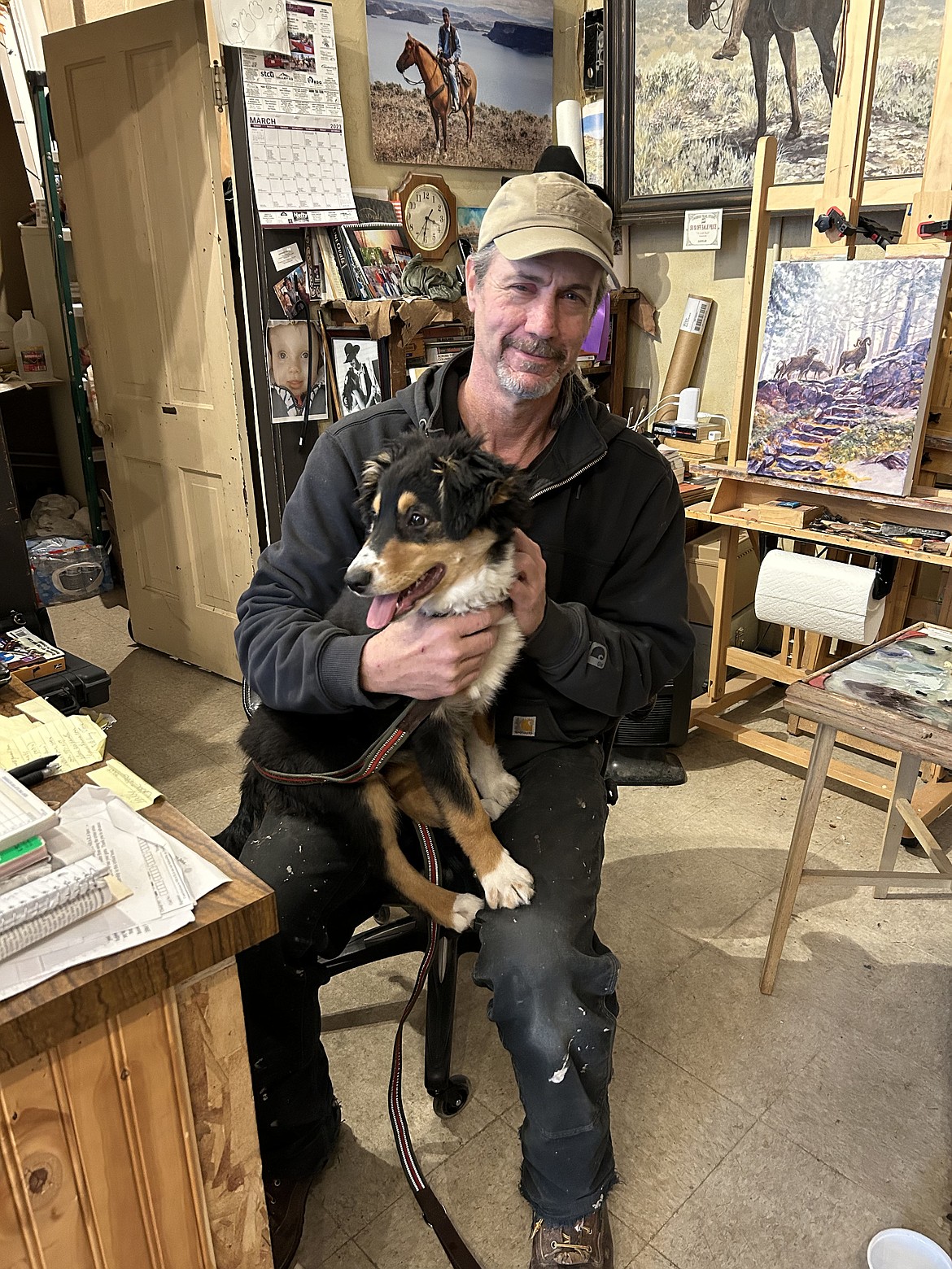 Studio owner and local artist Don Nutt and his dog Emmy. Nutt began creating art inspired by the Columbia Basin about 50 years ago and has since opened up his own studio – Cariboo Trail Studio – in Coulee City.