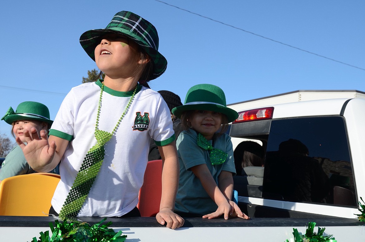 These cute kids were wearing the green and enjoying their ride in the St. Patrick's Day parade. (Kristi Niemeyer/Leader)