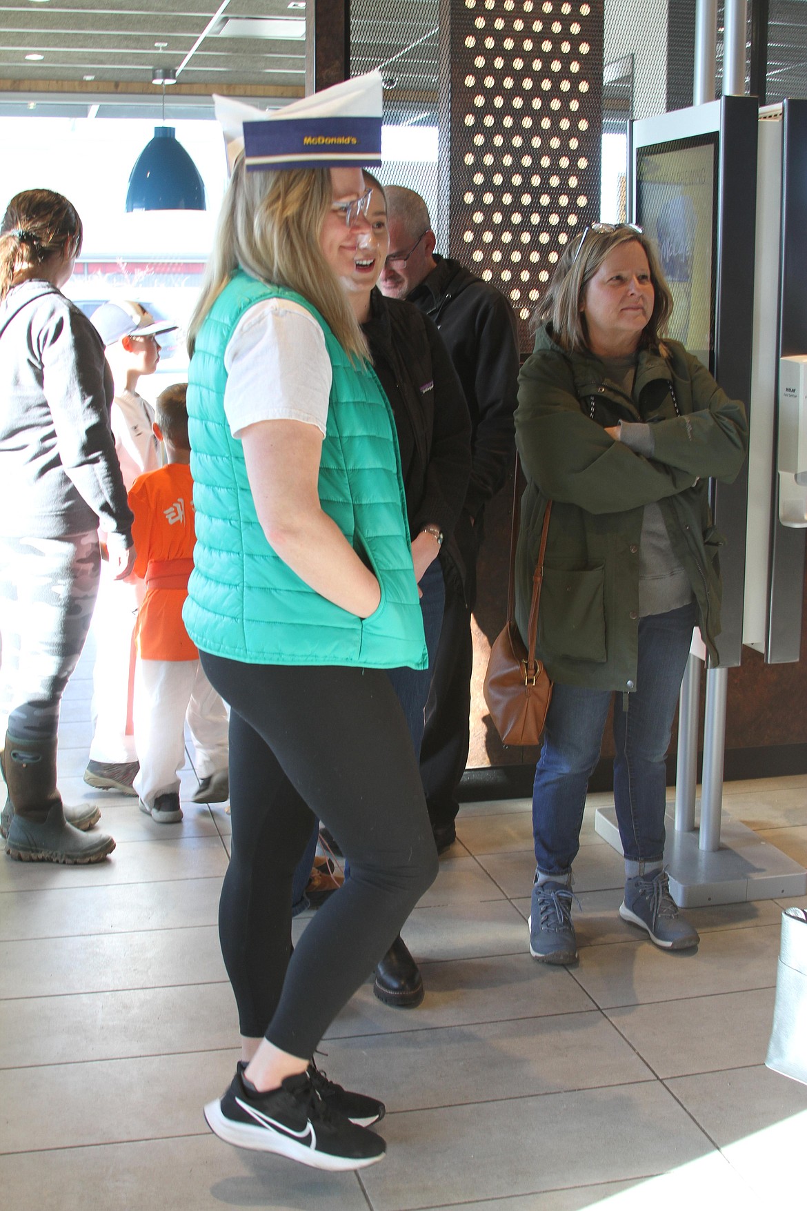Kootenai Elementary principal Kellie Knowles welcomes students and their families into the Ponderay McDonald's at a McTeacher's Night fundraiser.
