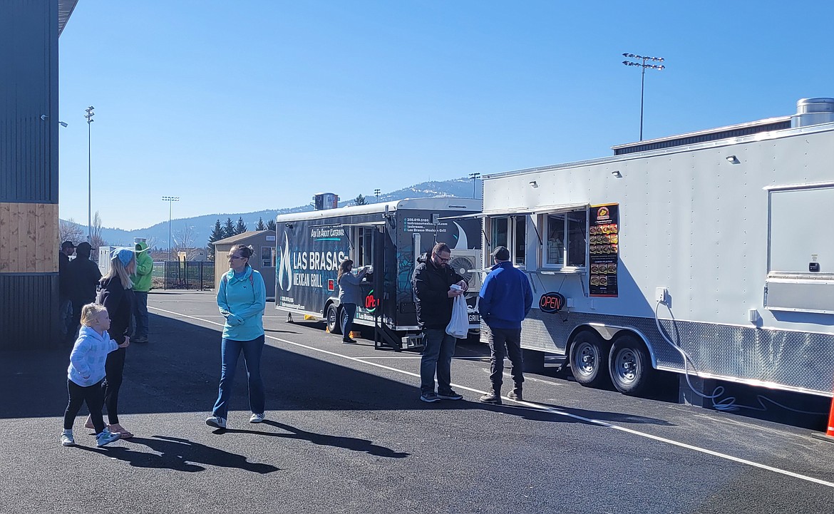 People gather at the Post Falls Pavilion on Horsehaven Avenue during its soft opening Tuesday. A grand opening celebration is expected to be held later this spring.