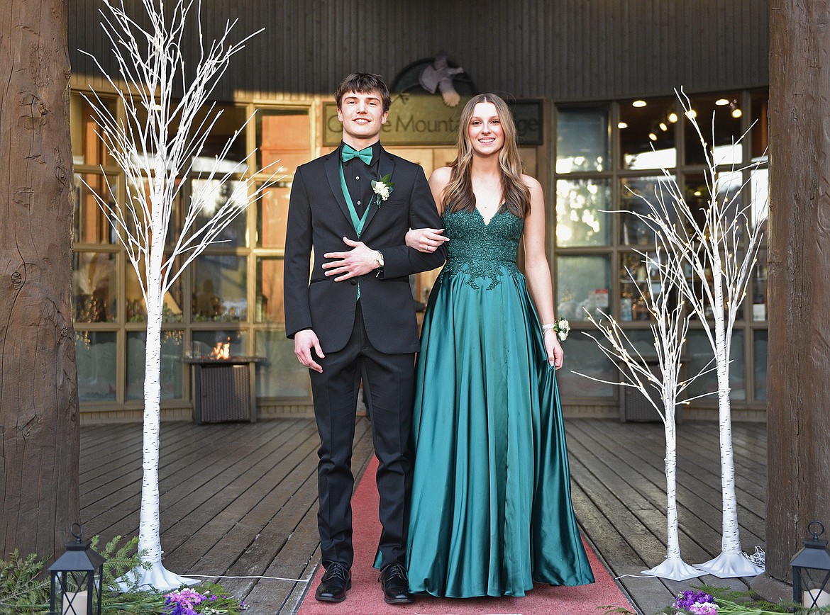 Students walk in the Grand March at the WHS prom on Saturday. (Whitney England/Whitefish Pilot)