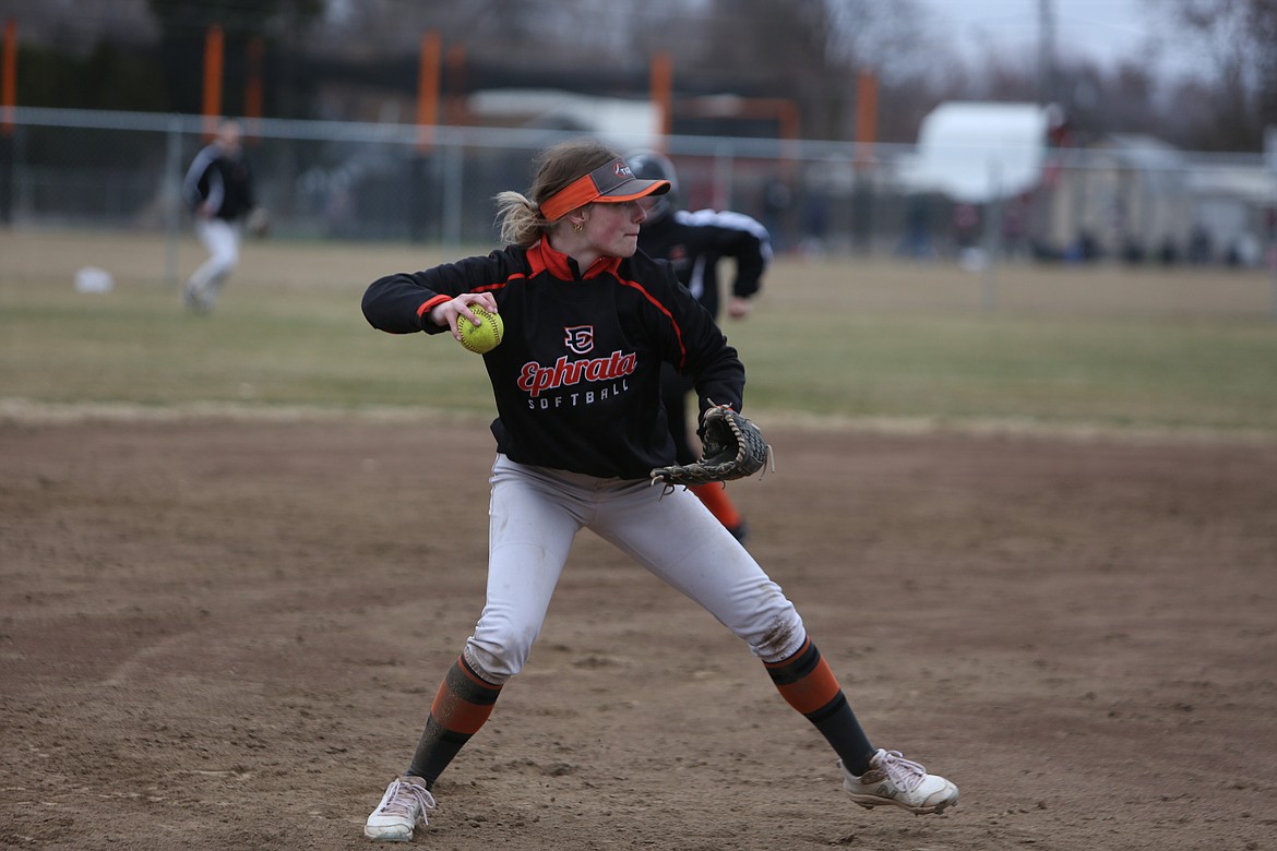 Ephrata senior Jackie Turner prepares to throw the ball back to first base during a Tiger practice on March 20.