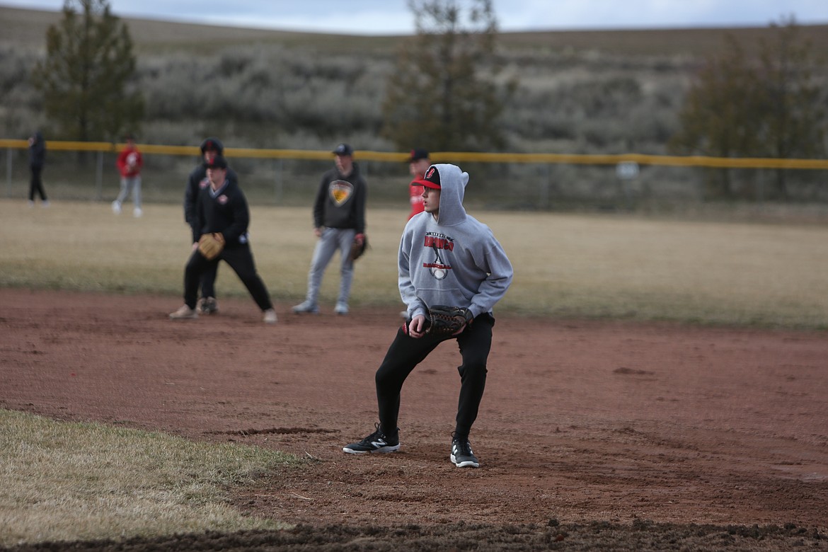 LRS sophomore Jayce Kelly waits at first base for a throw from a teammate.