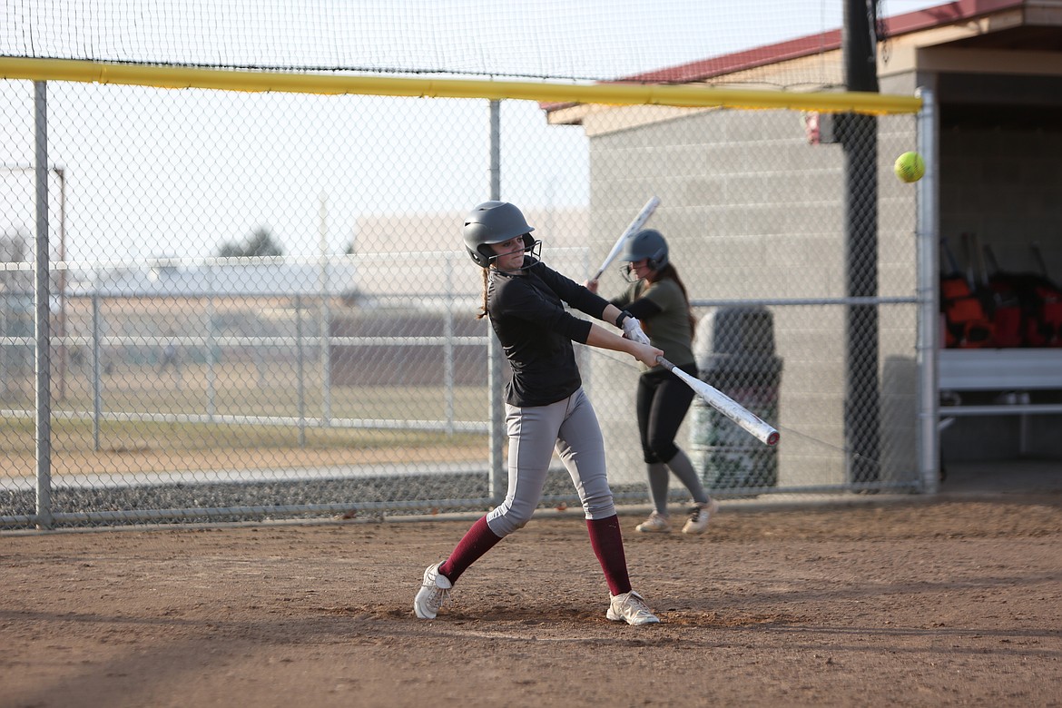 Moses Lake senior Marissa Cohee swings at a pitch during a Maverick practice.