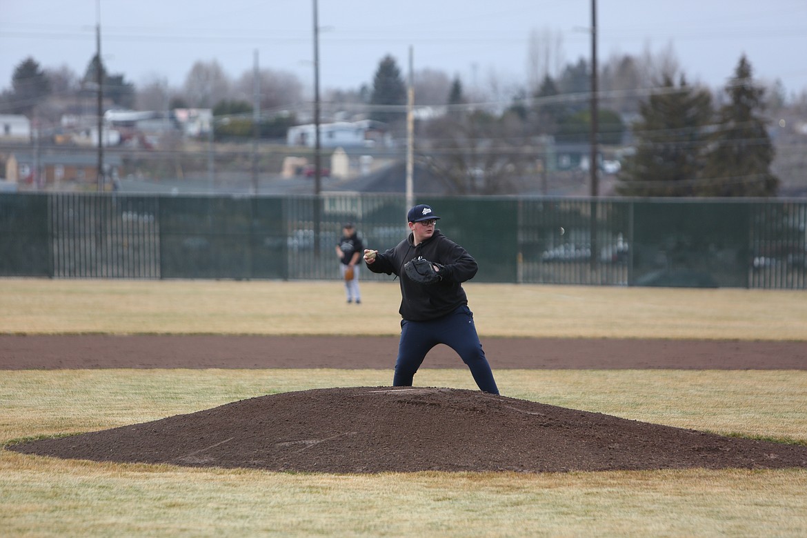 MLCA/CCS’ Brenden Schober throws the ball back to first at a Lions practice.