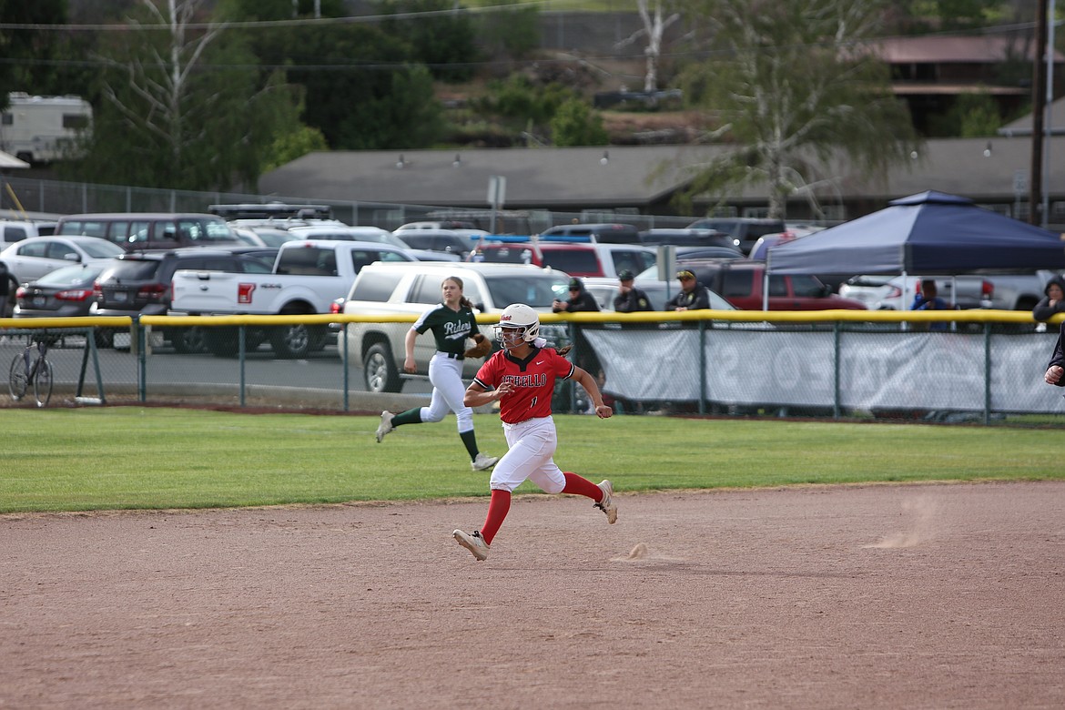 Othello junior Persayis Garcia (1) darts to second base during the 2A state fastpitch tournament in Selah.