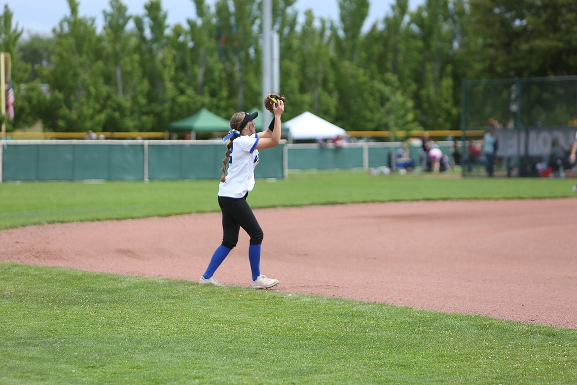 Warden senior Kaylee Erickson catches a fly ball in the infield at the 2022 2B state tournament in Yakima.