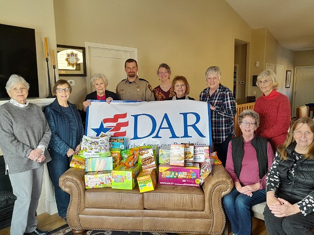 Daughters of the American Revolution, Chief Ignace Chapter, Kalispell, recently presented Flathead County Sheriff Brian Heino, with a variety of “grab and go” snack items for the department’s deputies and staff.