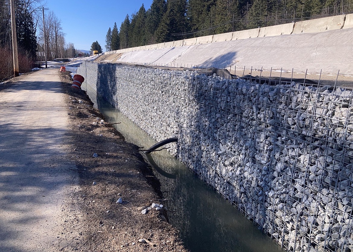 A look at a retaining wall constructed as part of the Lakeshore Drive/Sagle construction project. As part of the final phase, crews will finish the retaining wall along U.S. 95, pave the widened portion of the highway and rebuild the Serenity Lee Trail. In addition, construction on a new signal at Sagle Road will continue.