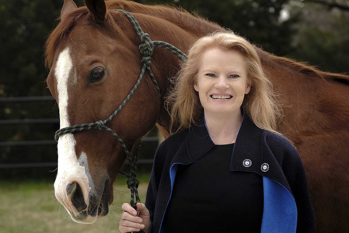 Robyn Jones is pictured with her horse Cat on Thursday, March 9, 2023 near her home in Dallas, Texas. (MSU photo by Kelly Gorham)