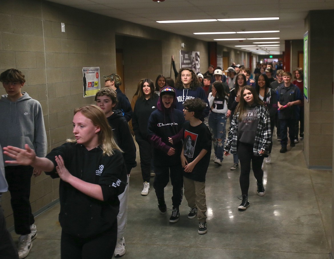 A group of excited eighth graders from Woodland Middle School walk to their next destination Thursday during a field trip to Kootenai Technical Education Campus in Rathdrum.