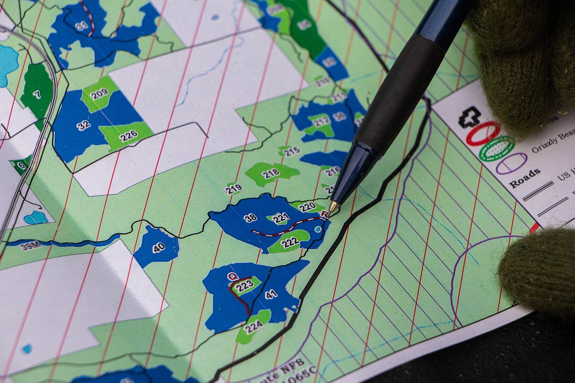 Paul Donnellon, a supervisory forester with the Flathead National Forest, points to a map of the Lake Five operation on March 9, 2023 just outside of Coram. (Kate Heston/Daily Inter Lake)