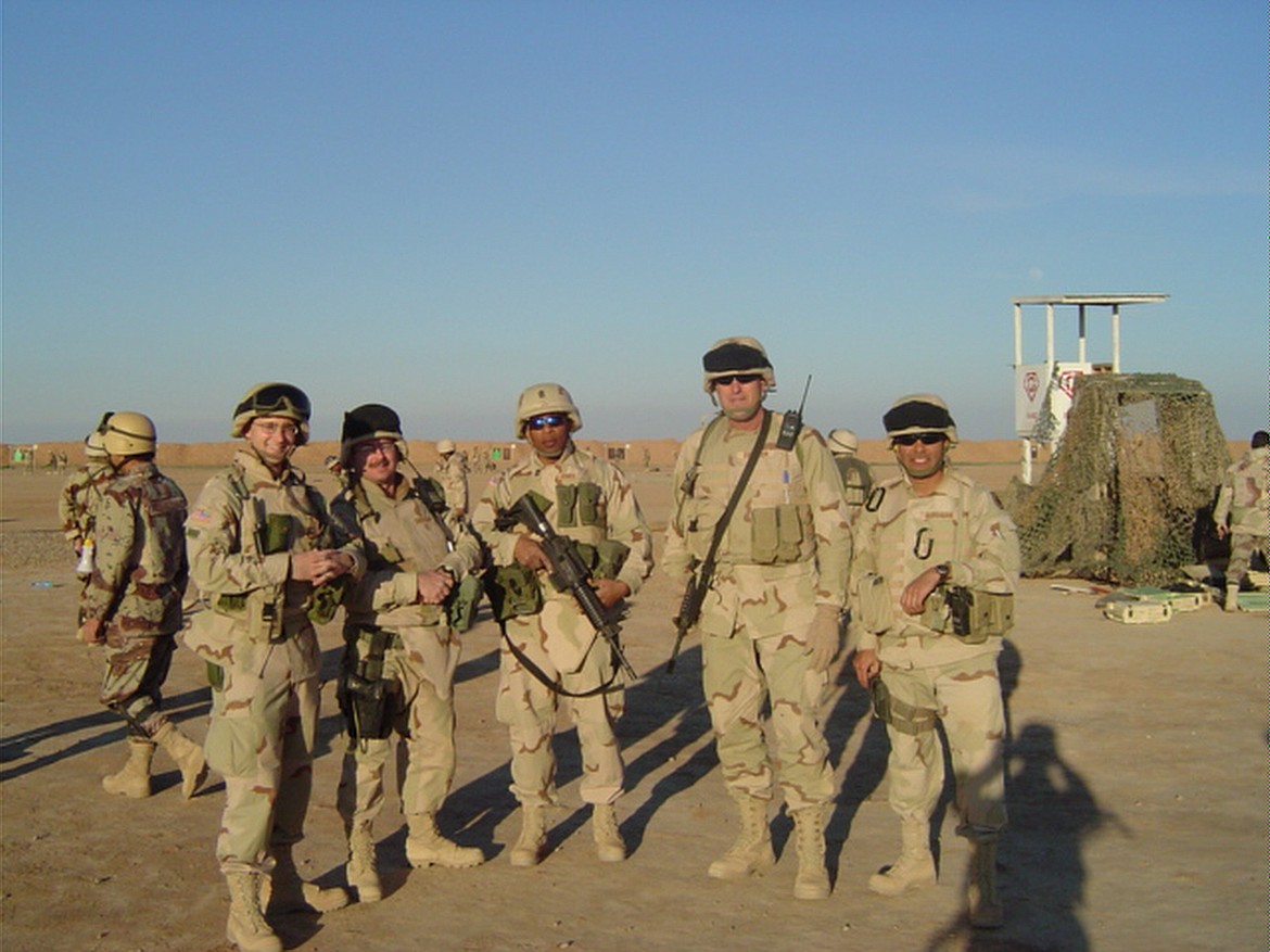 Jack Evensizer, second from right, and his U.S. Army adviser teammates are pictured during his 2004-2005 tour in Iraq.