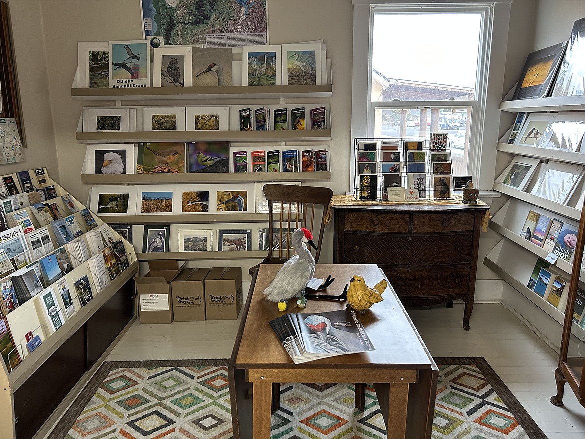 A room filled with bird memorabilia at the Old Hotel Art Gallery in Othello. There are bird photos and paintings as well as different pamphlets, magazines and books.