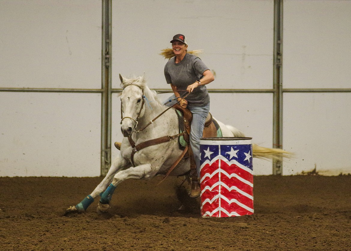 A barrel racer makes the turn during an event at the Grant County Fairgrounds in 2022. The fairgrounds hosts a number of equine events, so fairgrounds officials are building additional horse stalls.