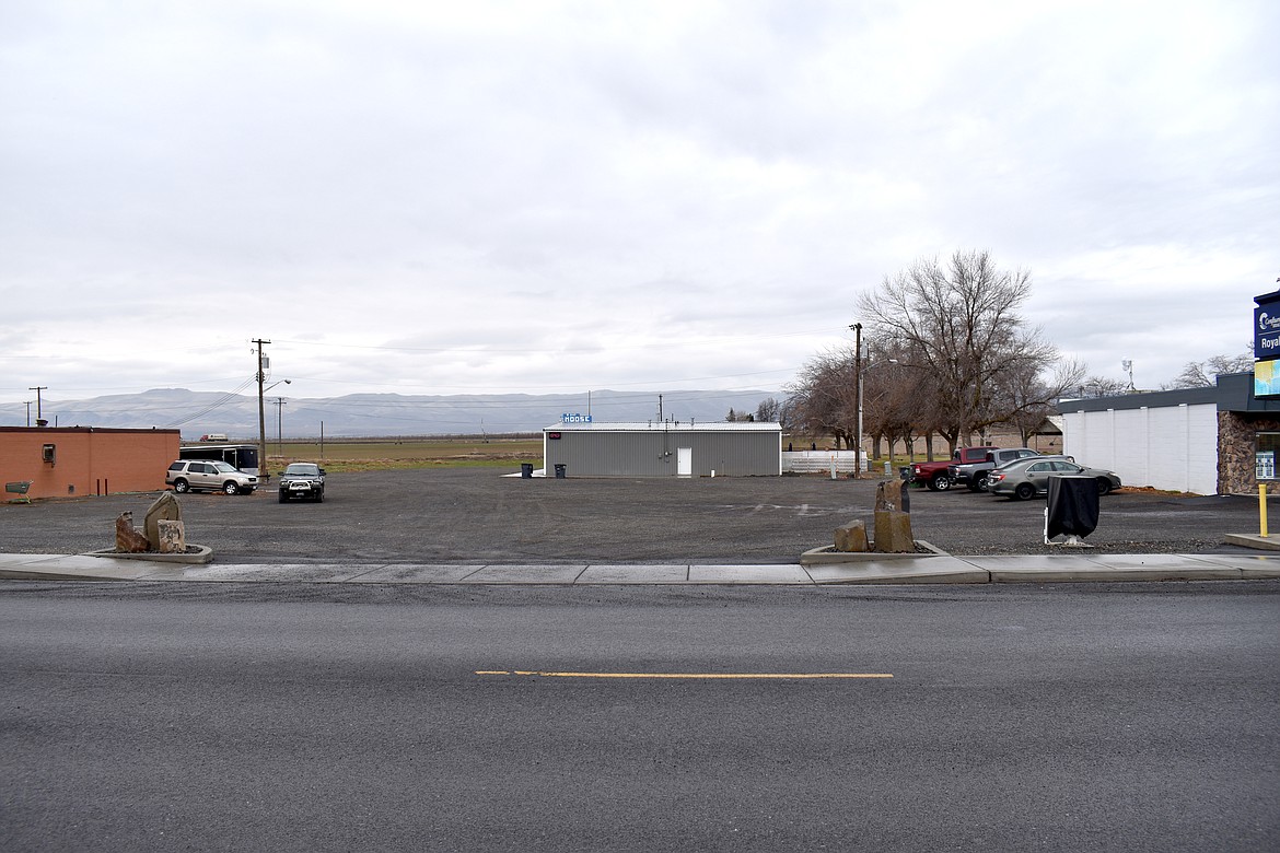 The Friends of the Library in Royal City have their eye on this city-owned lot for their new building, abutting the city park and kitty-corner from the existing building on the town’s main street.