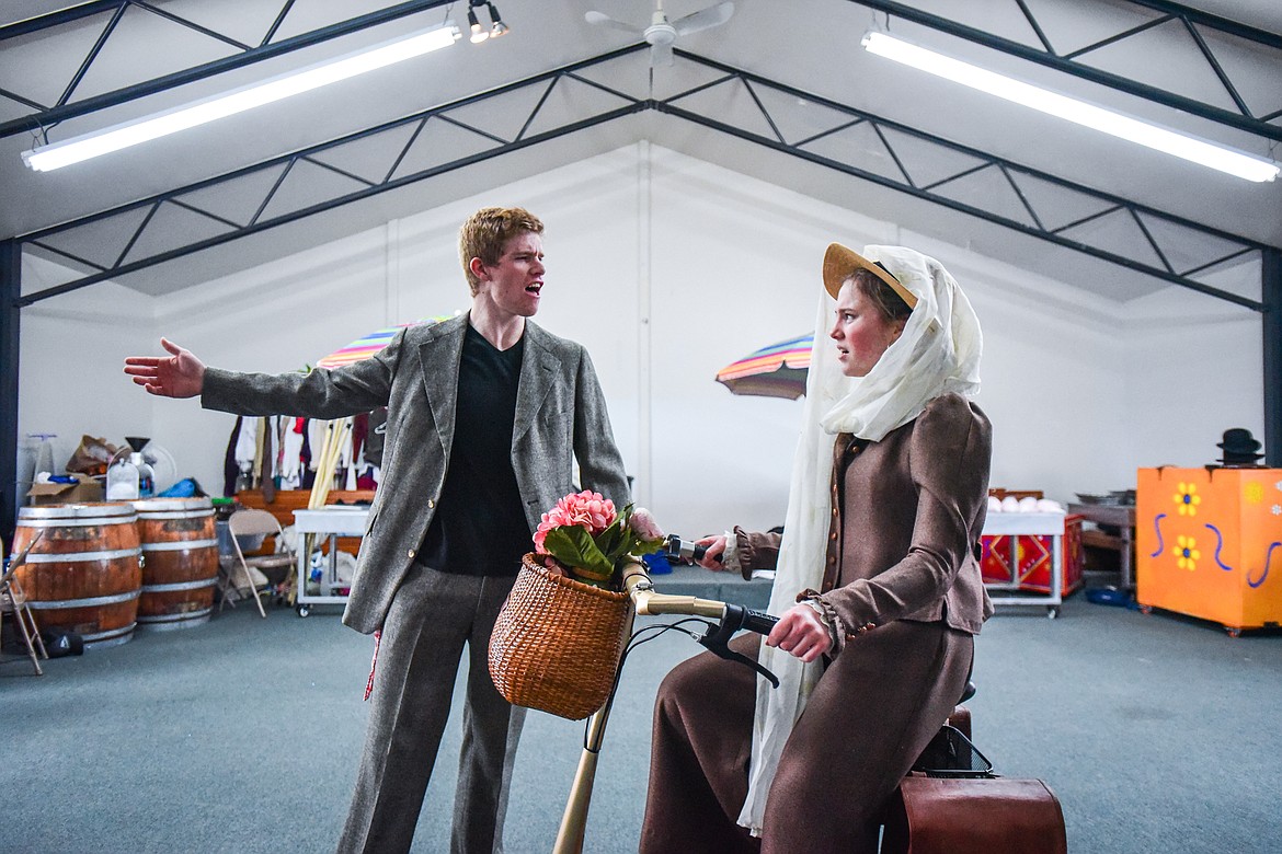 Jarom Holcomb as Caractacus Potts and Keira Reed as Truly Scrumptious peform a scene as the Homeschool Theater Club practices their performance of Chitty Chitty Bang Bang on Friday, March 24. (Casey Kreider/Daily Inter Lake)