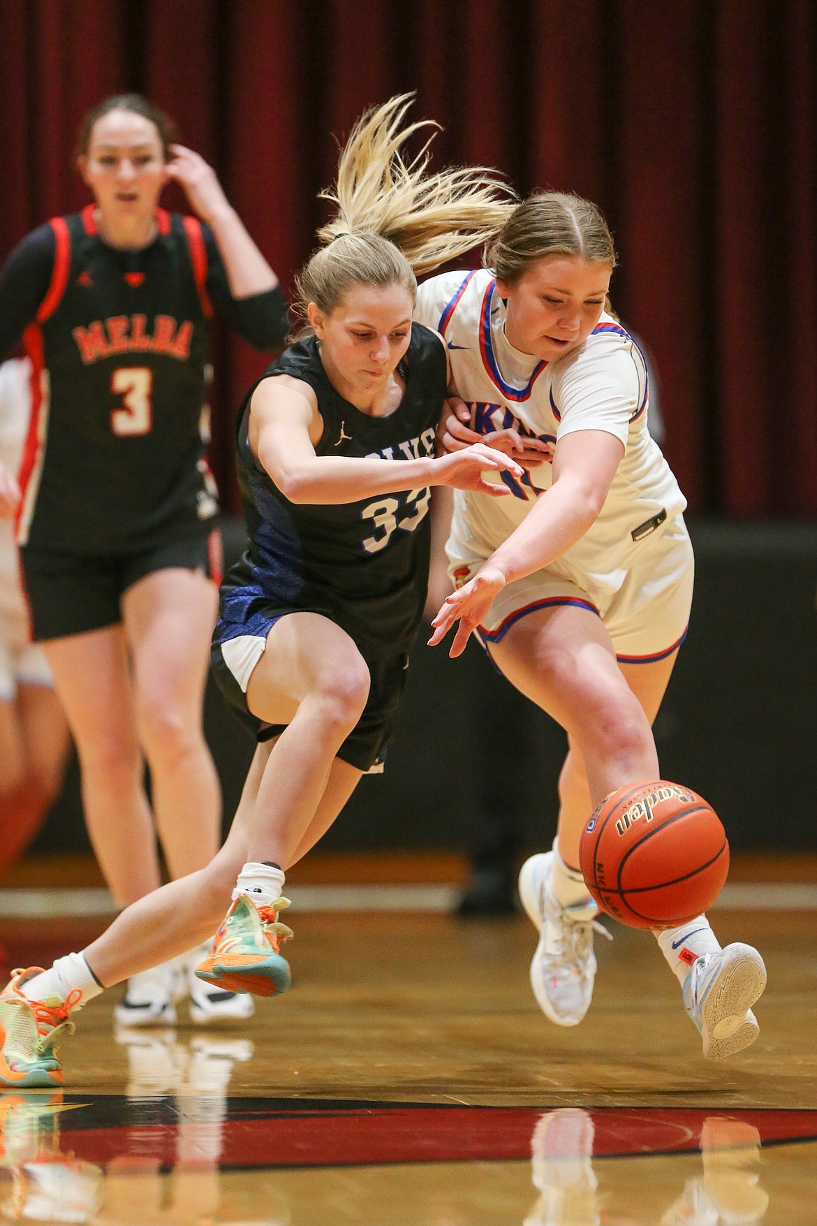 JASON DUCHOW PHOTOGRAPHY
Coeur d'Alene forward Madi Symons battles for a loose ball with Timberline's Lauren McCall during the first half of Saturday's 20th annual girls Idaho High School All-Star Game at North Idaho College.