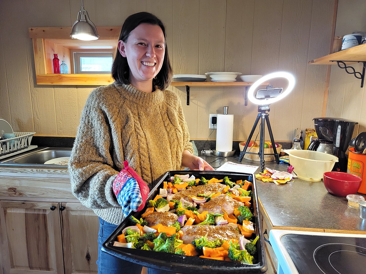 Mackenzie Sachs, a registered dietitian who works with FAST Blackfeet’s produce prescription program on the Blackfeet Reservation, in northwestern Montana, prepares food during an online cooking class. (Photo courtesy FAST Blackfeet)